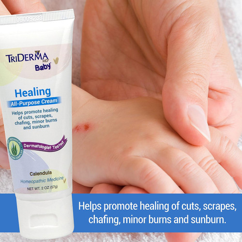 TriDerma baby healing cream being applied to diaper area – non-greasy formula spreads easily and wipes off clean